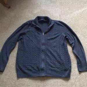 Cable knit sweater with full zipper front. 55/35/10 cotton, poly, wool blend.